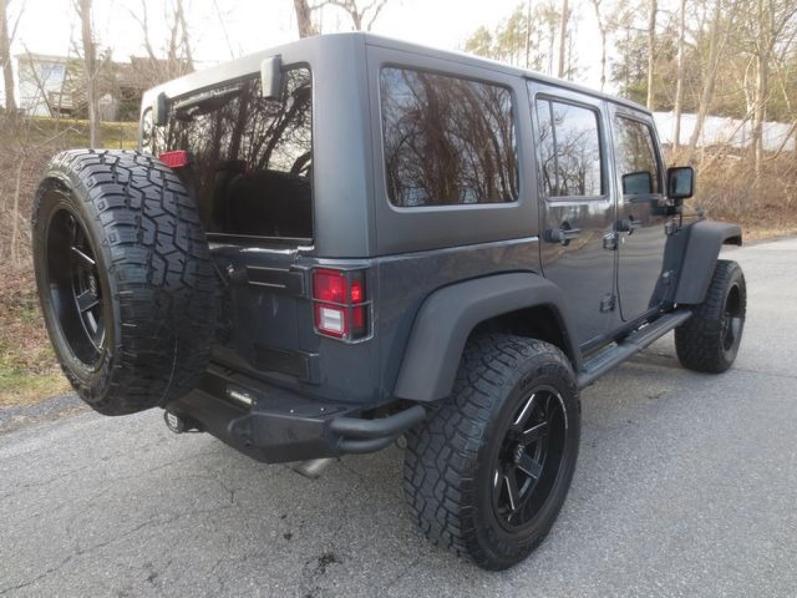 2016 Gray /Black Jeep Wrangler Unlimited Sport (1C4BJWDG6GL) with an 3.6 L v6 engine, 6 Speed Manual transmission, located at 270 US Route 6, Mahopac, NY, 10541, (845) 621-0895, 41.349022, -73.755280 - Photo #3